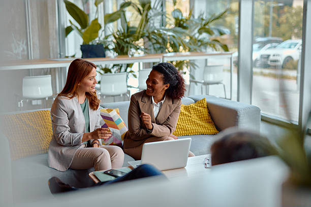 istock Businesswomen discussing during a meeting in a modern office 2214926207