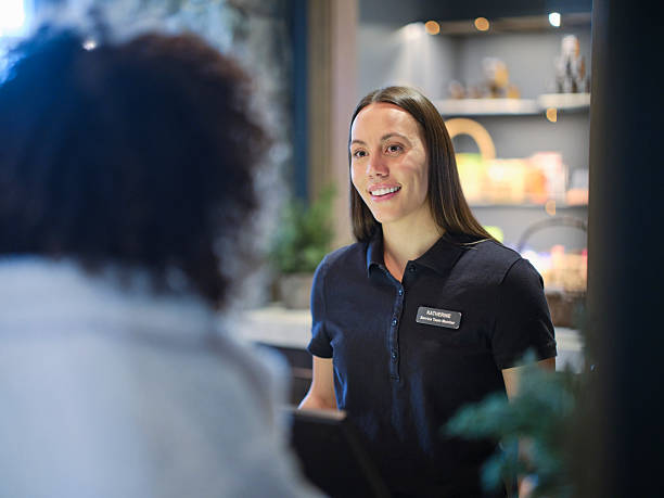 istock Reception Desk Employee at a Luxury Hotel 2214926599