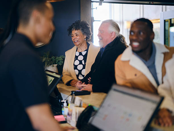 istock Senior Aged Couple Checking In to a Hotel 2214926749
