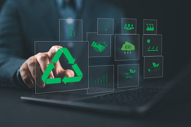 istock Sustainable development planning concept. Man using a laptop with virtual icons related to recycling, ESG business sustainability investment strategy renewable energy and environmental protection. 2214945342