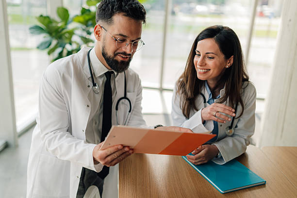 istock Doctors discussing medical chart in hospital 2214947480