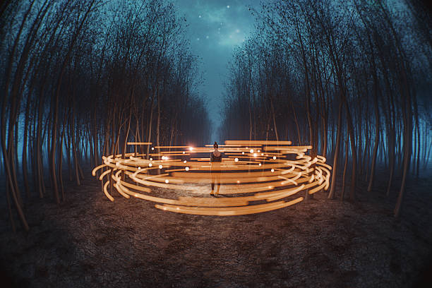 Young woman standing in mysterious forest at night