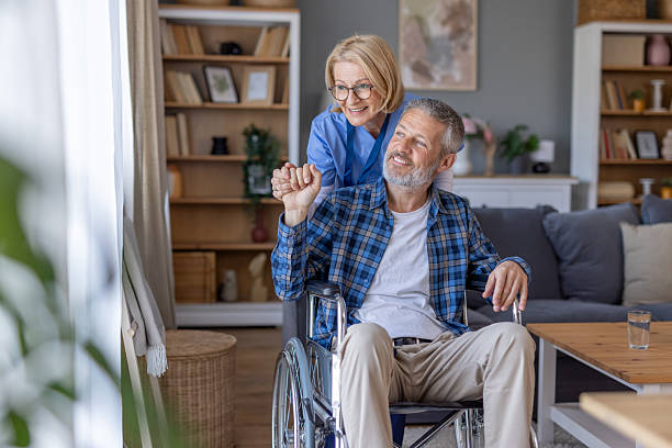 istock Joyful caregiver and man share a delightful moment together 2214959324