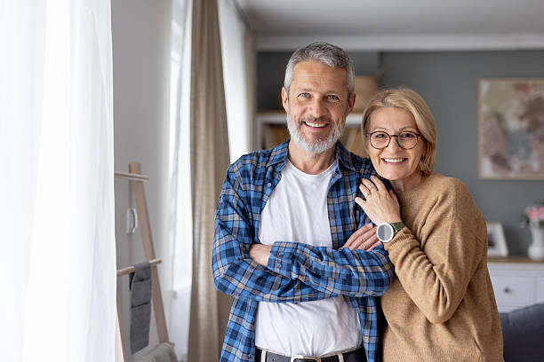 istock Couple smiling close together, enjoying their moment 2214959351