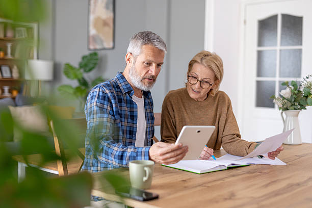 istock Couple Exploring Financial Strategies on Digital Tablet Together 2214959391