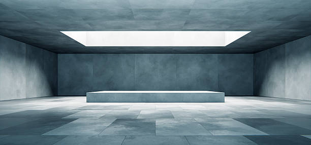 istock Modern empty concrete room interior with podium and natural skylight 2214960410