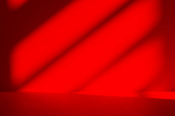 istock Studio style background wall decoration presentation uses white and red tones. with shadows cast from a nearby window, concept creating a decorative 2214975300