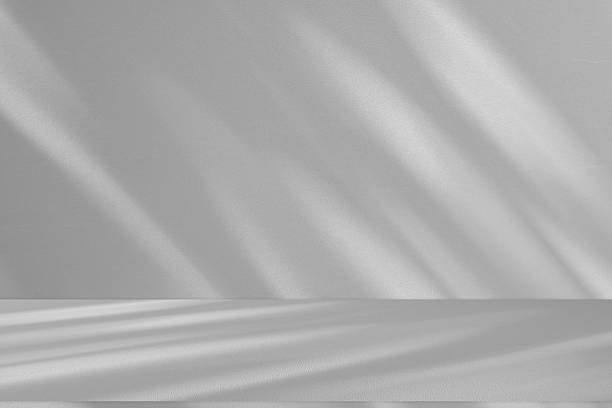 istock Wall interior background, studio and backdrops show products.with shadow from window color white . background for text insertion and presentation product 2214975365