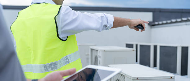 istock Engineers team use tablet check air condition systems on site. Contractor and inspector inspection construction during project.civil Forman check quality assurance. Audit, inspect, quality control. 2214977841