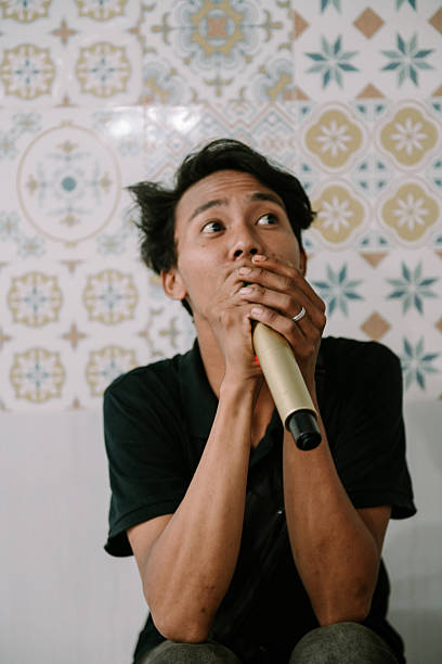 istock Anxious performer gripping the mic awaiting his turn backstage 2214981822