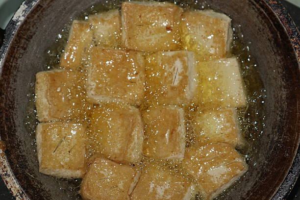 istock fried tofu cooked in hot oil 2214982100