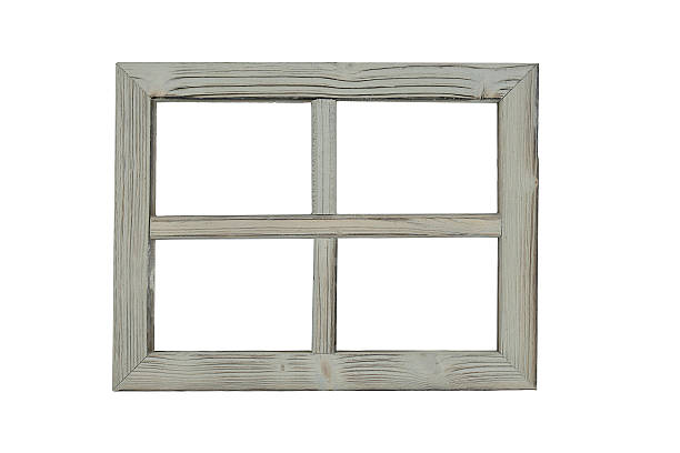 istock Wooden frame with four openings ready for decorative display in a cozy home setting 2214982387