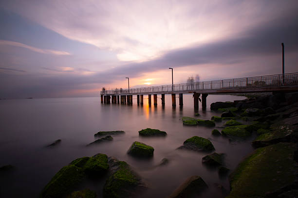 istock Old pier taken with long exposure technique 2214984999