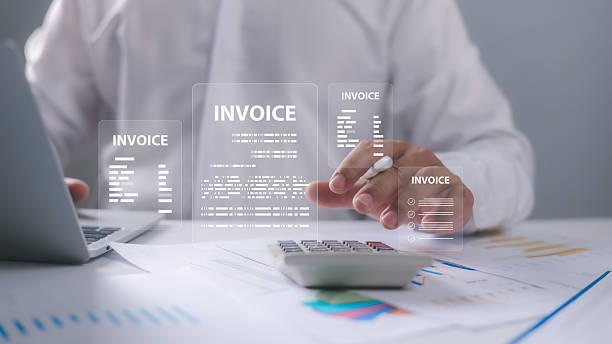 Digital online e-invoice concept, Businessman using laptop computer with invoice icon, E-tax, Digital receipt, Invoice for payment, Digital invoice document, Online invoice processing, Tax accounting