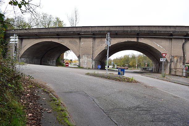 istock twin aches bridge across a traffic circle 2214995519