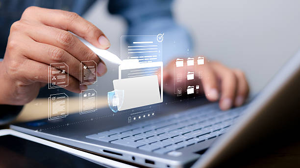 istock Privacy protection, secret secured lock, safety or security to archive file or document. Person holding lock document file folder with padlock. 2214995969