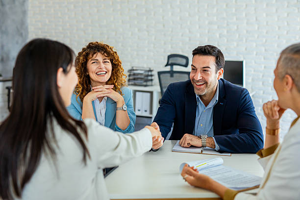 istock Business team celebrating successful project in boardroom 2214996156