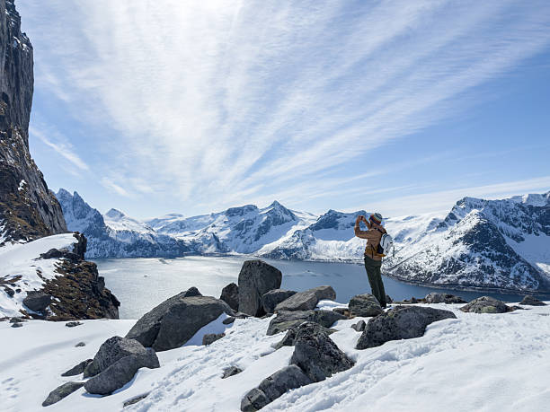 istock Man snowshoeing in mountain ridge in Norway 2214996213