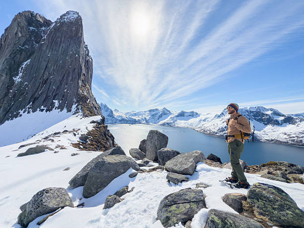 istock Man snowshoeing in mountain ridge in Norway 2214996232