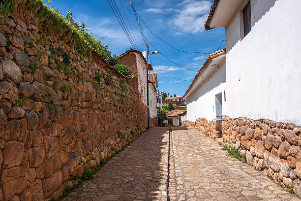 istock Traditional cobbled streets in Chinchero, Peru, with white adobe walls 2214999865