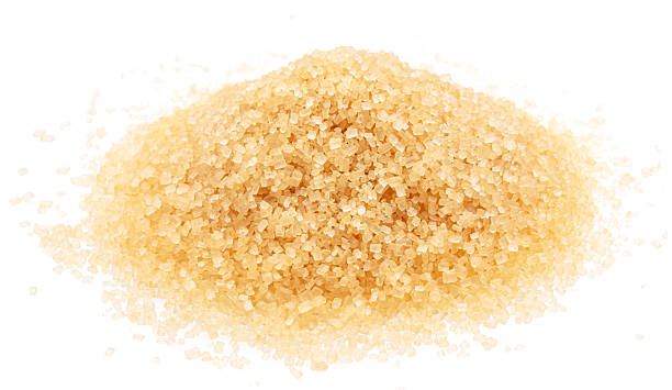 istock Pile of light brown sugar, isolated on white background. Top view. 2215000107