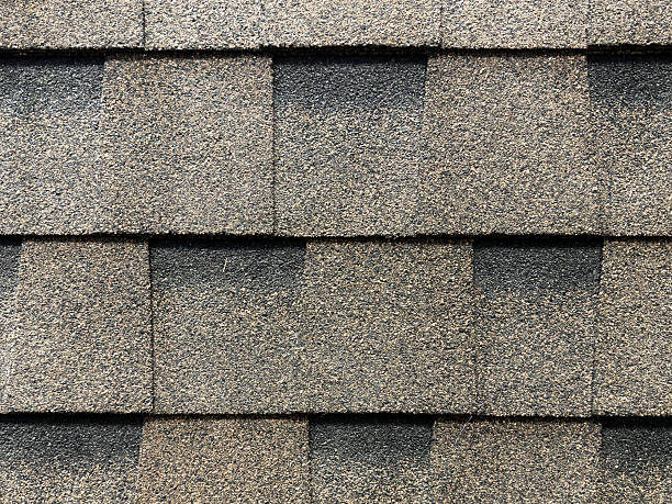 istock Asphalt roofing shingles texture background. House roof shingles 2215003163