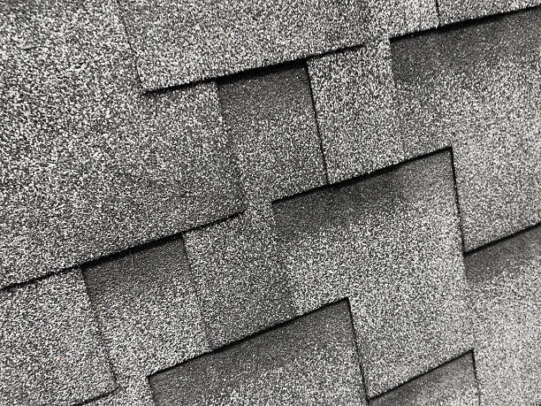 istock Asphalt roofing shingles texture background. House roof shingles 2215003863