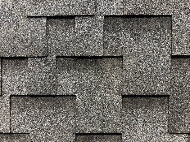 istock Asphalt roofing shingles texture background. House roof shingles 2215003902