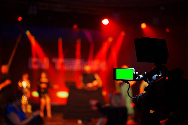 istock a green Flip-up screen of a professional video camera. 2215004230