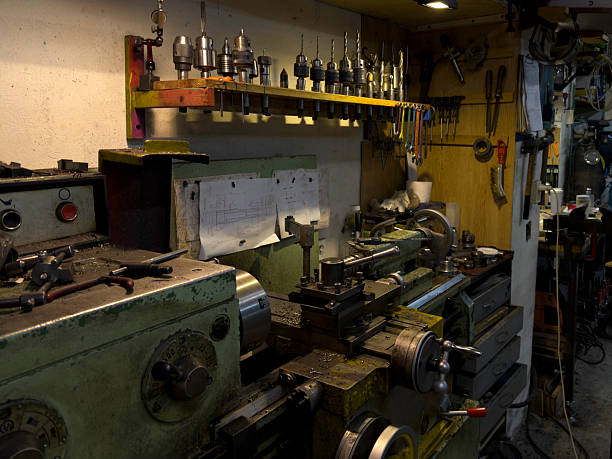Santa Clara, Cuba - December 26, 2024: An old lathe equipment inside the workshop of a Cuban man.