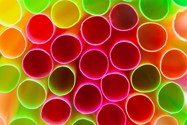 Bundling colorful plastic straws together creates a vibrant and festive atmosphere, enhancing the joy of parties and celebrations with their bright hues and playful patterns