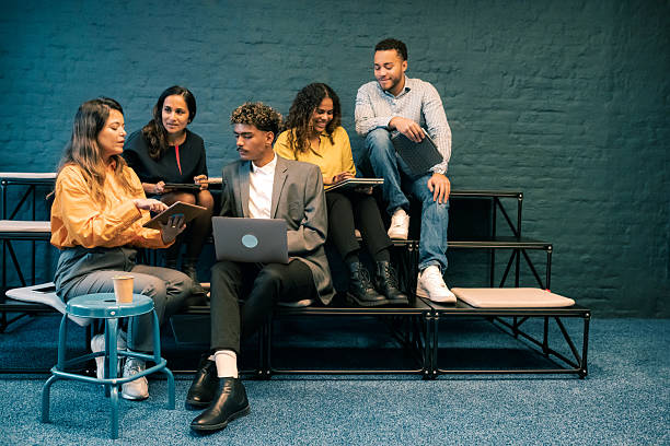 istock young people together in business summit 2215011849