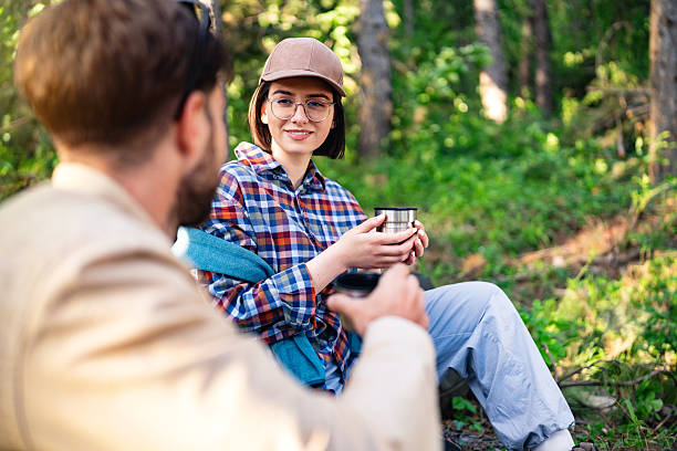 istock Couple enjoying a hiking break in a peaceful forest setting 2215012212