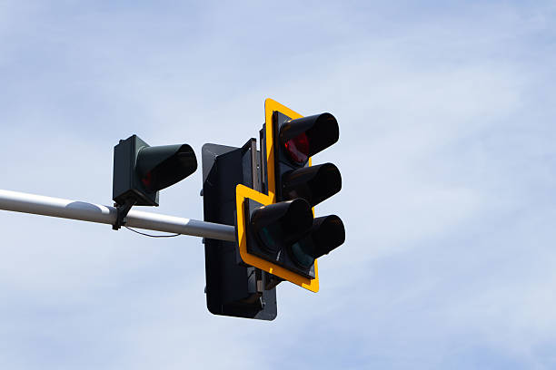 istock Traffic Lights Against a Cloudy Sky 2215012446
