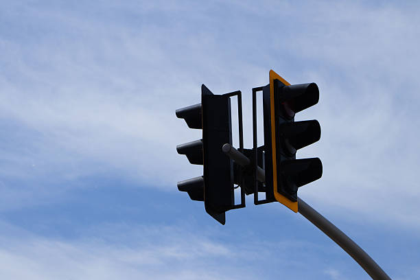 istock Traffic Lights Against a Cloudy Sky 2215012460