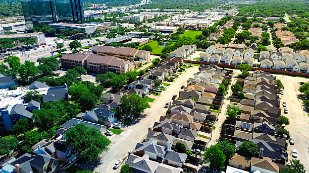 istock Rapid growing mixed used development area along Interstate 635 Lyndon B Johnson Freeway, glass office building, hotel complex, urban park, narrow lot houses, townhomes and business park, Texas 2215012467