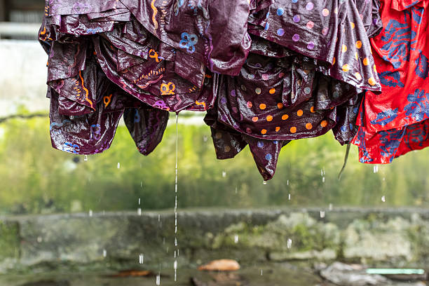 Wet batik clothes drying with water droplets