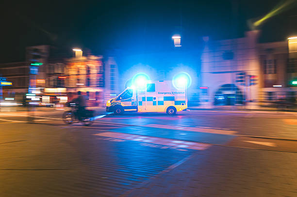 istock Ambulance in motion at night 2215017164