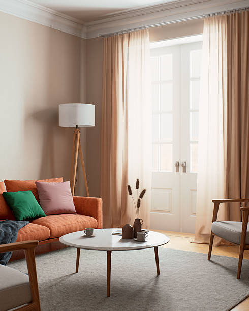 istock A Stylish Living Room featuring Abundant Natural Light and Chic, Upscale Decor Elements 2215017677