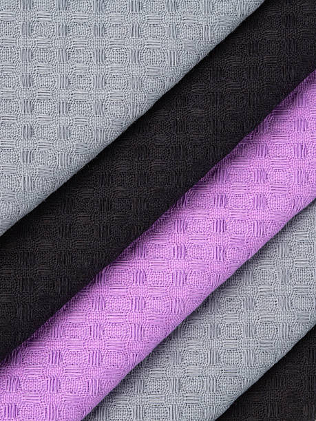 istock cotton waffle towels for the kitchen hang on hooks on a bracket against a white wall background 2215026744