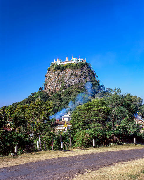A view of Taung Kalat Monastery rising from the arid plains of central Myanmar.