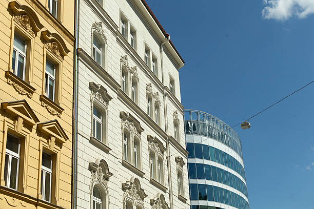 istock Architectural Contrast: Historic vs Modern Buildings in Urban Scene 2215030551