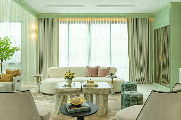 istock Interior of a luxurious sitting room with bay window sofas and coffee table. 2215031430