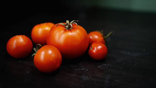 Arrangement of fresh tomatoes in different sizes