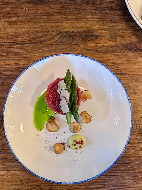 istock Beef tartare with truffles and asparagus 2215034217