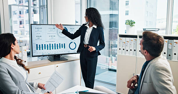 istock Online, group and meeting for data, business and collaboration for financial performance or digital. Monitor, team and people with tech for investment, accountant and colleagues with info on screen 2215036068