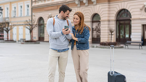 istock Couple Sharing a Moment While Viewing Their Photos 2215037088