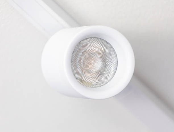 istock Modern white led spotlight illuminating a white wall 2215041212