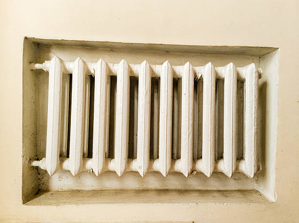 istock A white radiator in a corner of a wall 2215042406
