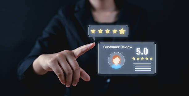 istock A person interacts with a virtual five-star customer review rating, highlighting positive feedback and user satisfaction. 2215044275